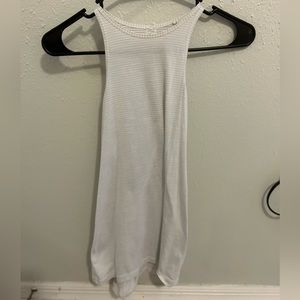 Lululemon white with stripes tank top. size 2. Slit in back